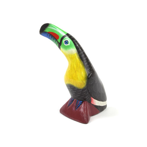 Toucan sculpté et peint