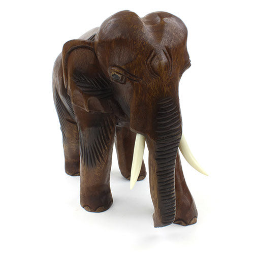 Éléphant sculpté en bois de Saman, très grande taille