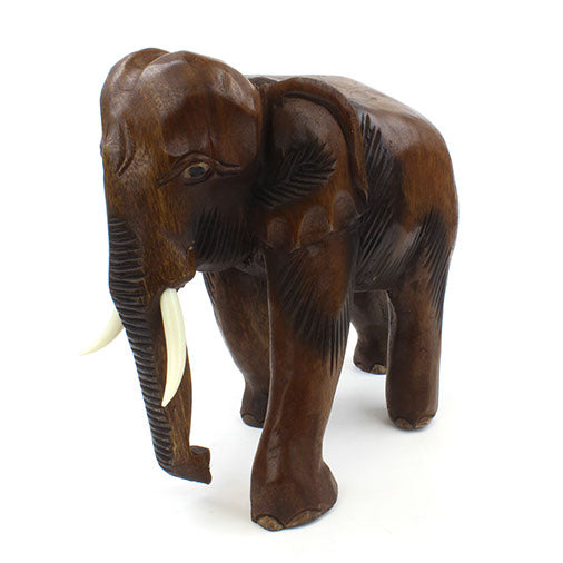 Éléphant sculpté en bois de Saman, très grande taille