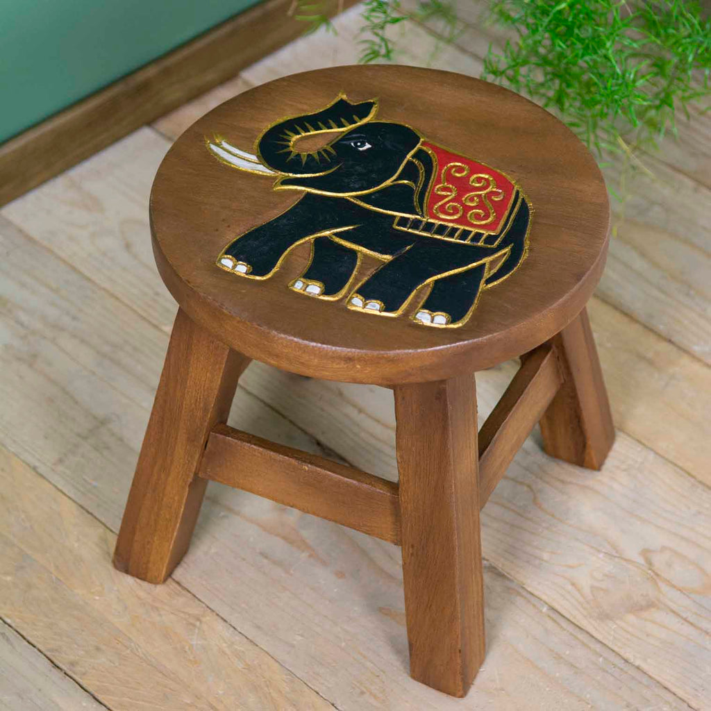 Tabouret sculpté en bois de Saman, motif éléphant