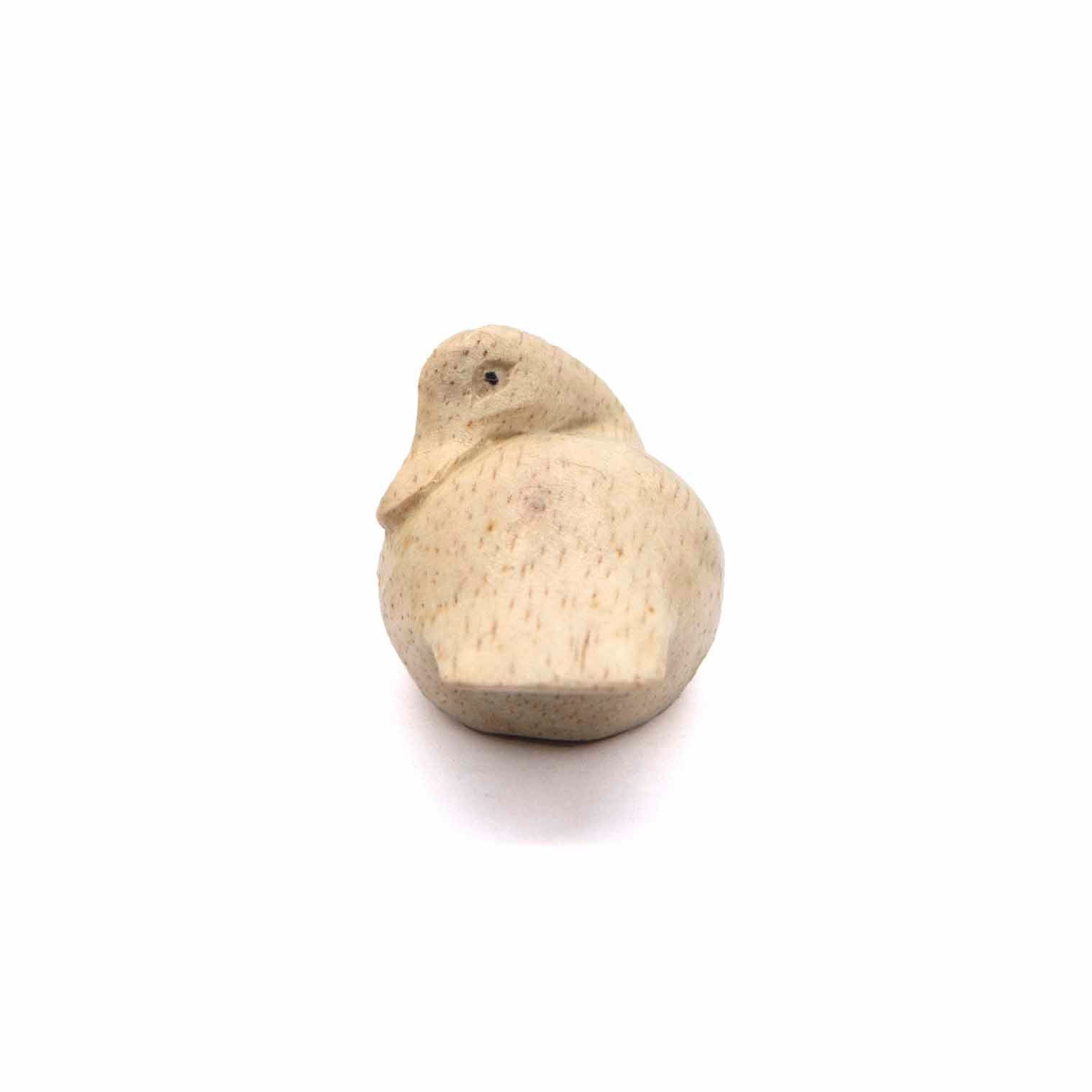 Sculpture de canard endormi en bois d'Albizia