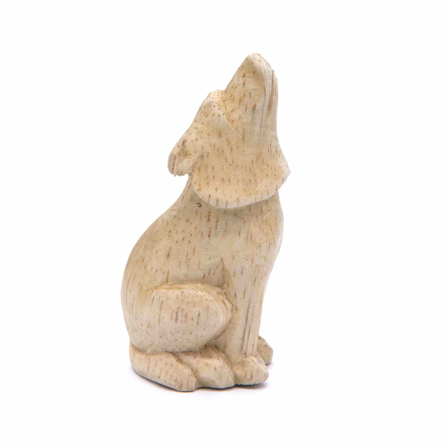 Petite sculpture de loup hurlant