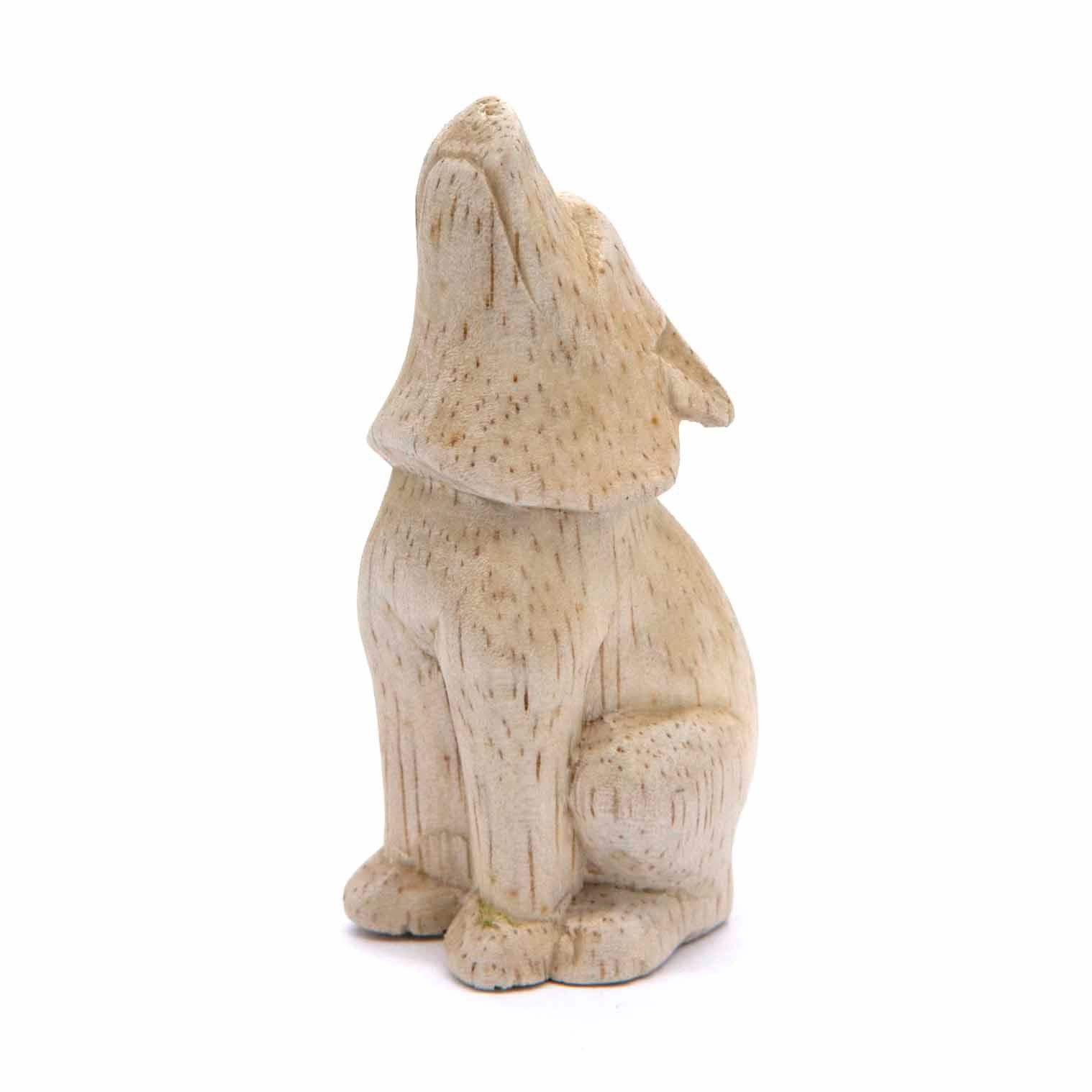 Petite sculpture de loup hurlant