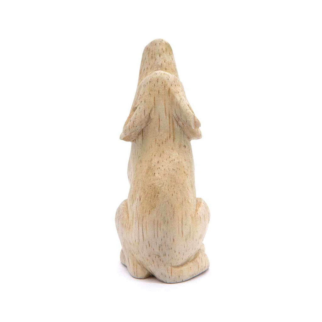 Petite sculpture de loup hurlant