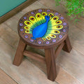 Tabouret en bois de raintree sculpté paon